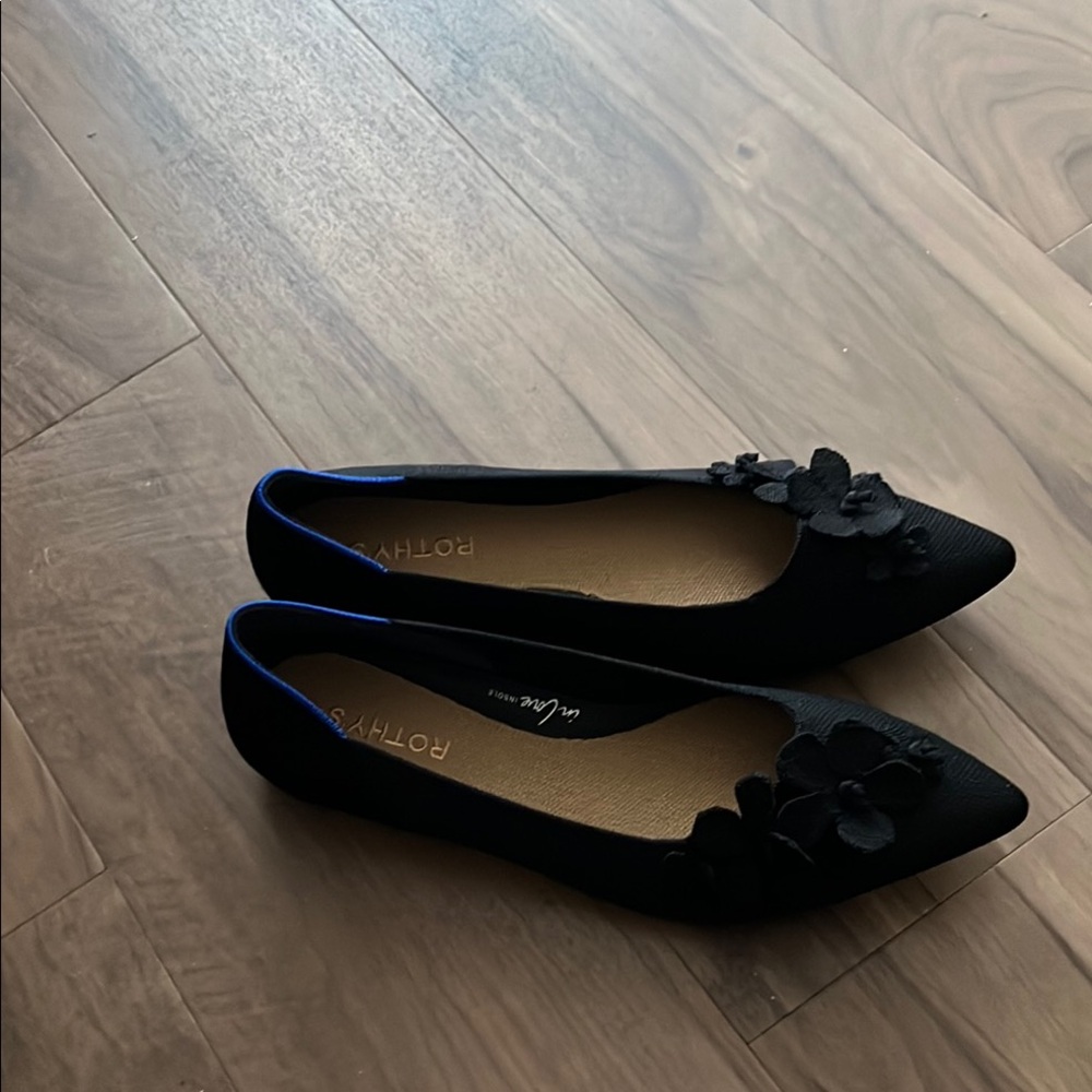 Rothy's Elegant Black Flats with Floral Detail